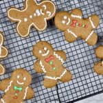 gingerbread cookies scattered on cooling rack