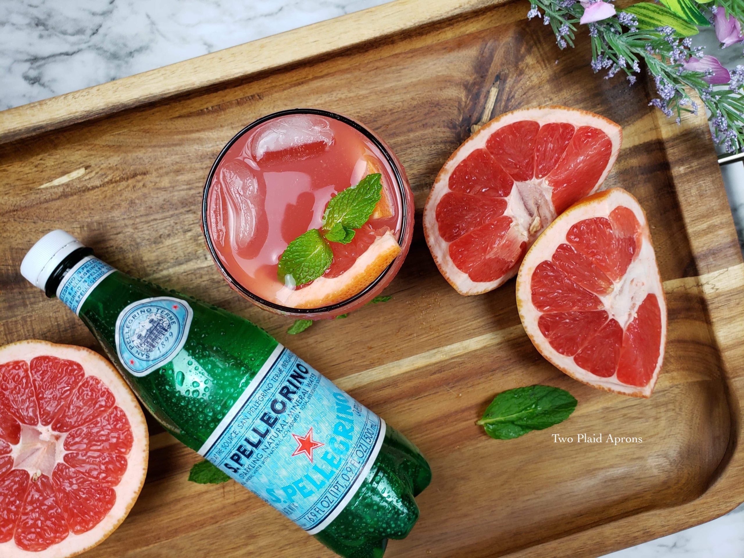 grapefruit spritzer made with San Pellegrino and mint