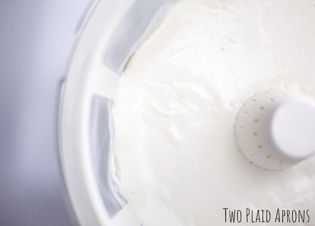 top view of greek yogurt in yogurt strainer