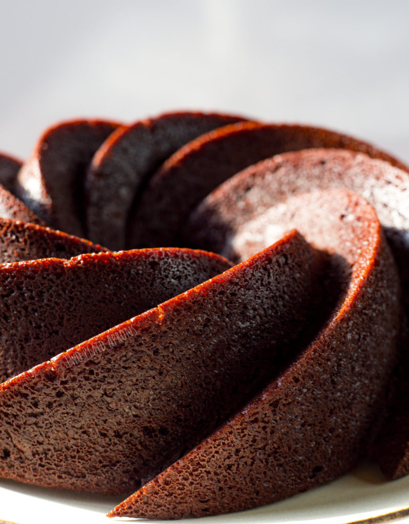 Vegan chocolate cake just popped out of its cake mold.