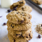 An up close view of the stack of cranberry chocolate oatmeal cookies.