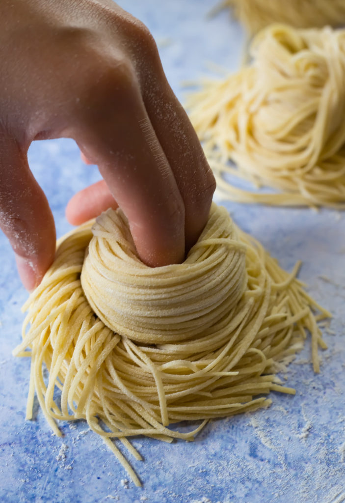 Step 4.2 of portion shaping ramen noodle.