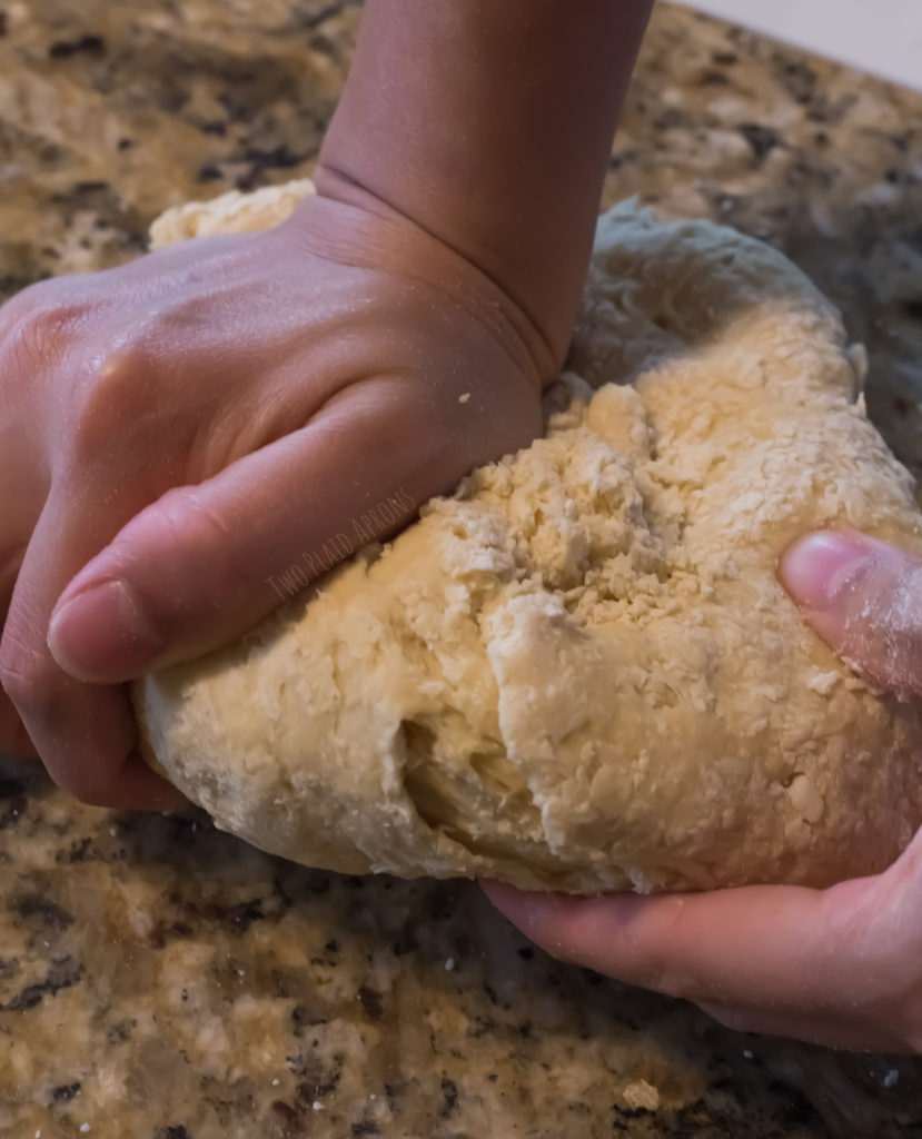 Kneading the ramen noodle dough by hand.