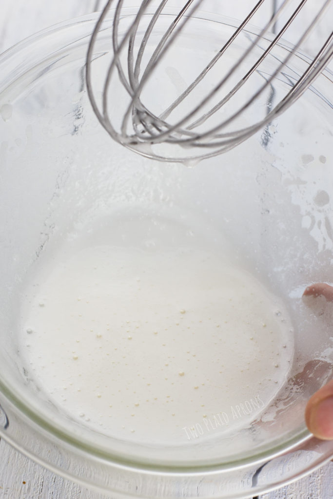 Mid stage of whisking aquafaba with sugar.