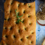 Top down view of our easy classic rosemary focaccia with za'atar seasoning.
