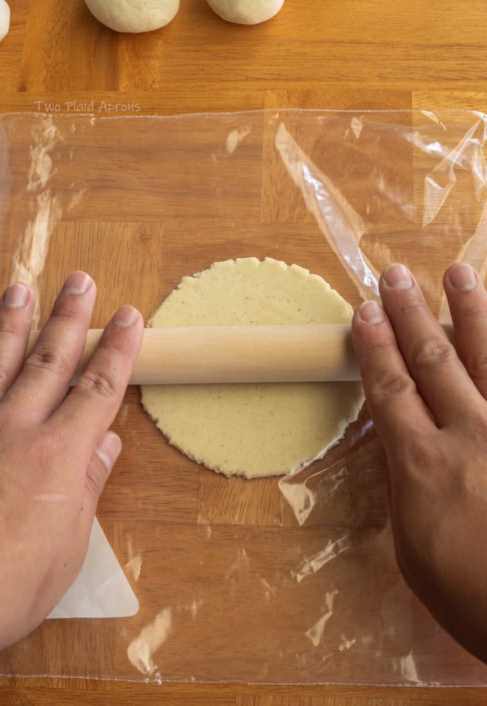 Rolling the tortilla between a Ziploc bag with a rolling pin.