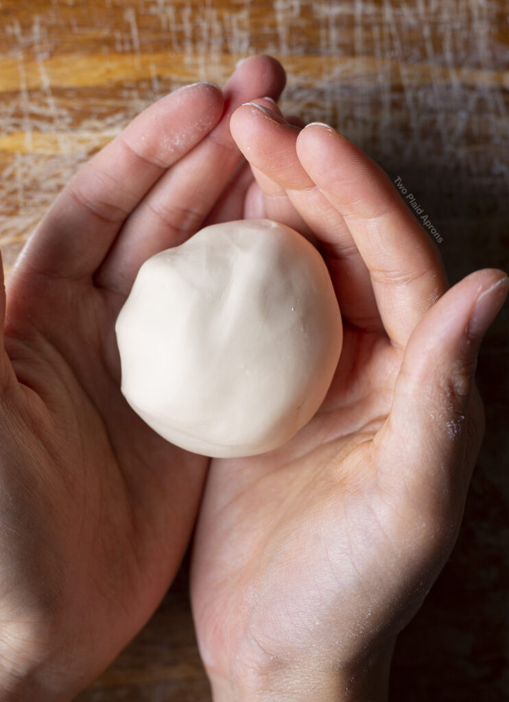 Ball of tapioca dough in hand