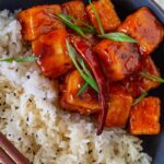 Pan-fried General Tso's Tofu with white rice.