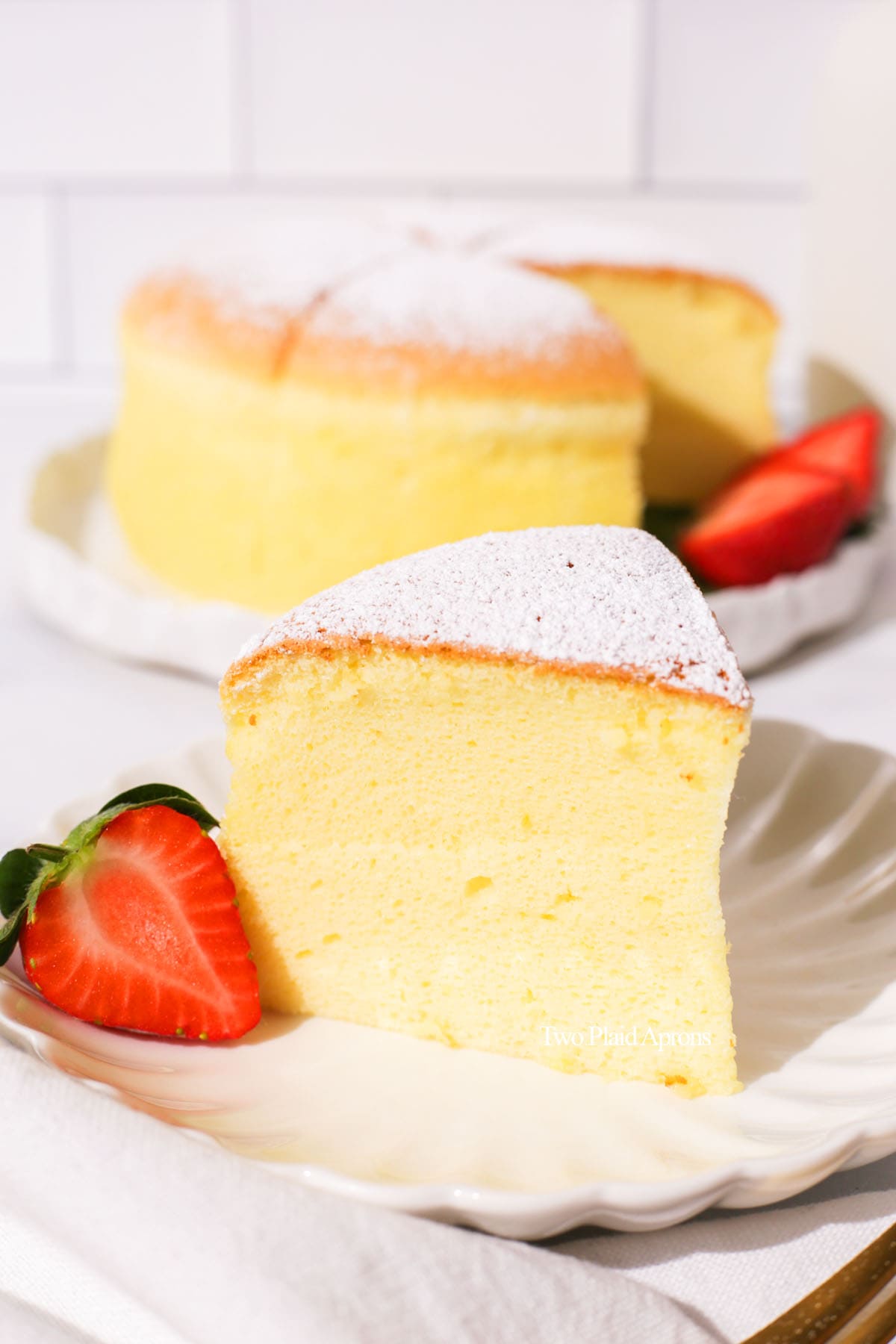 A slice of Japanese cotton cheesecake on a plate.