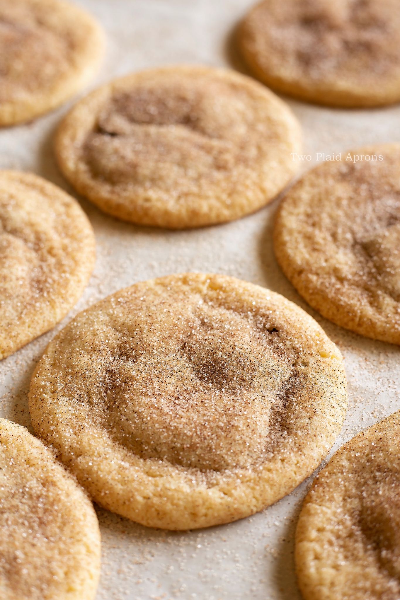 A close up view of Nutella filled snickerdoodle cookies on a tray.