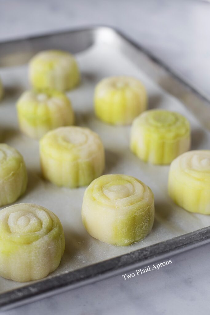 Side view of marbled snow skin mooncake with custard filling.