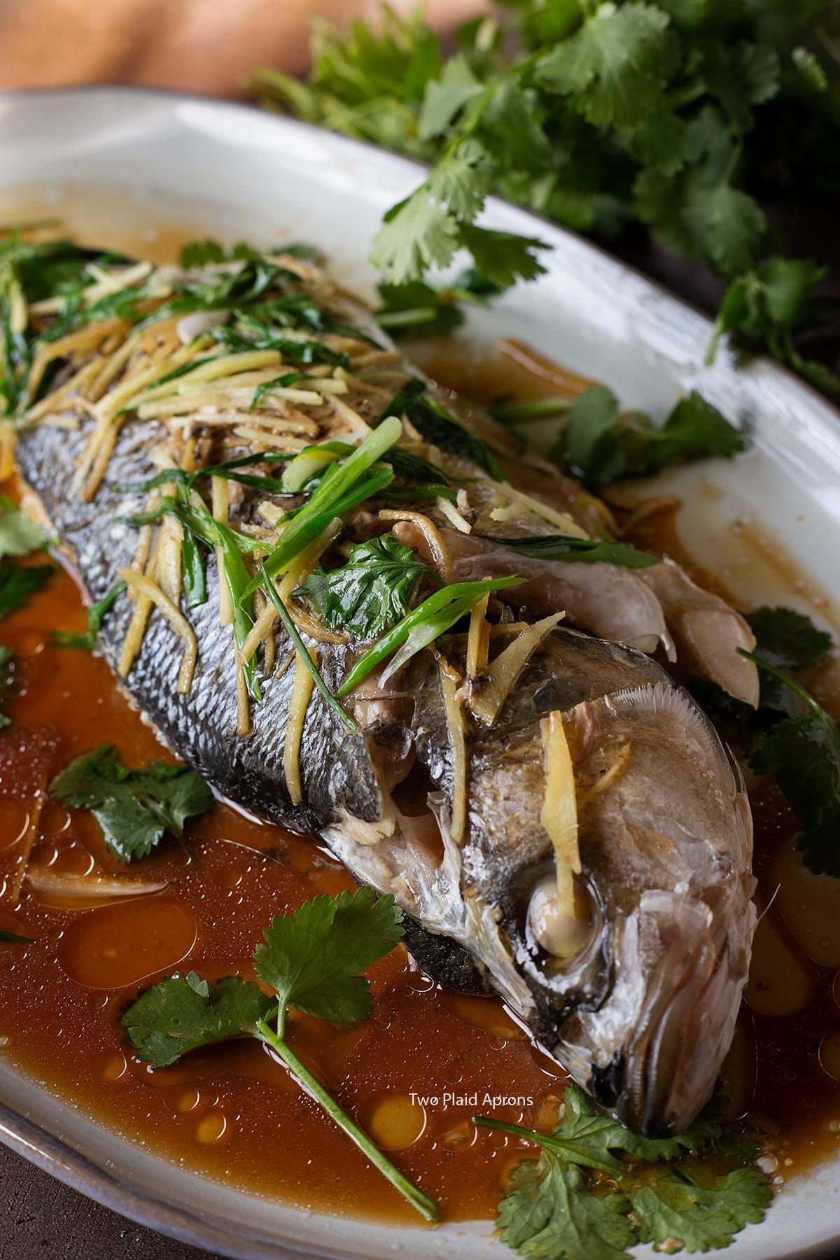 Steamed whole stripped bass with ginger and scallion.