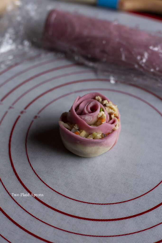 A finished rose dumpling on the silicon mat.