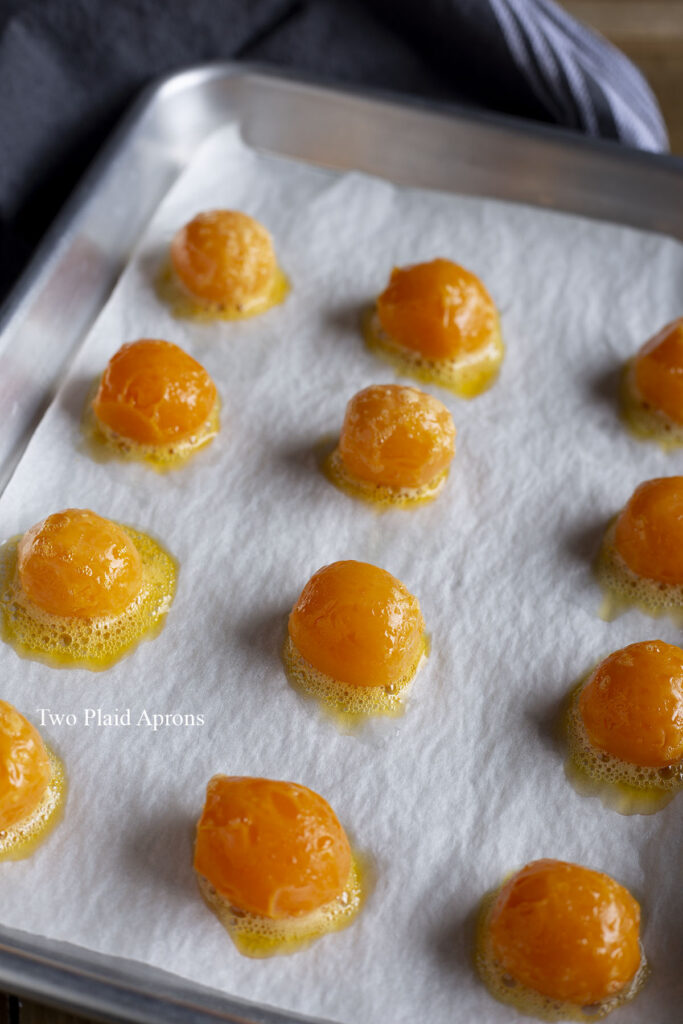 The salted yolks on a sheet pan after baking.