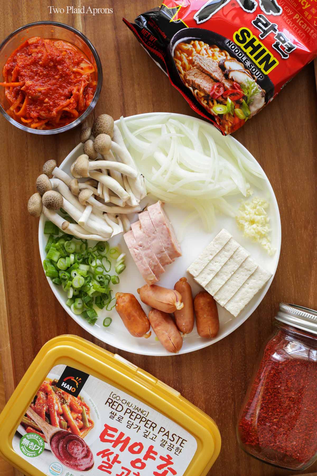 Top down view of all the ingredients for making a simple Korean army stew.