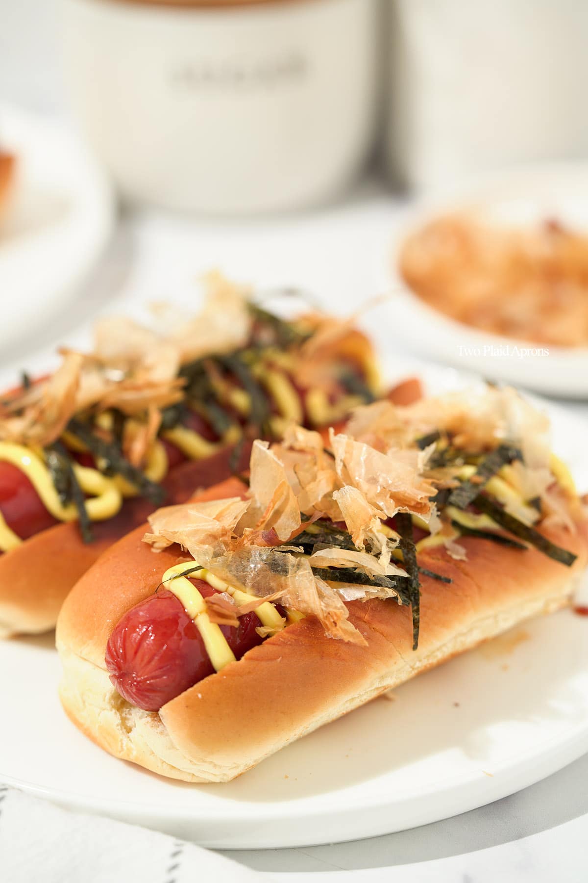 An assortment of Japanese hot dogs with various toppings