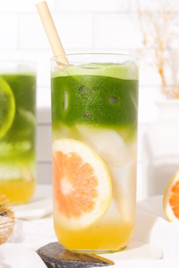 Two glasses of grapefruit matcha tonic.