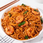 A plate of shrimp lo mein.
