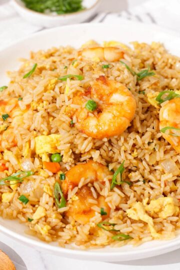 A plate of better than takeout shrimp fried rice made at home.