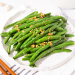 Din Tai Fung inspired Chinese garlic green beans on a plate.