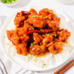 Close up of the General Tso's Chicken on a bed of white rice.