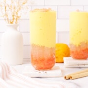 Mango pomelo sago layered in glass cup.