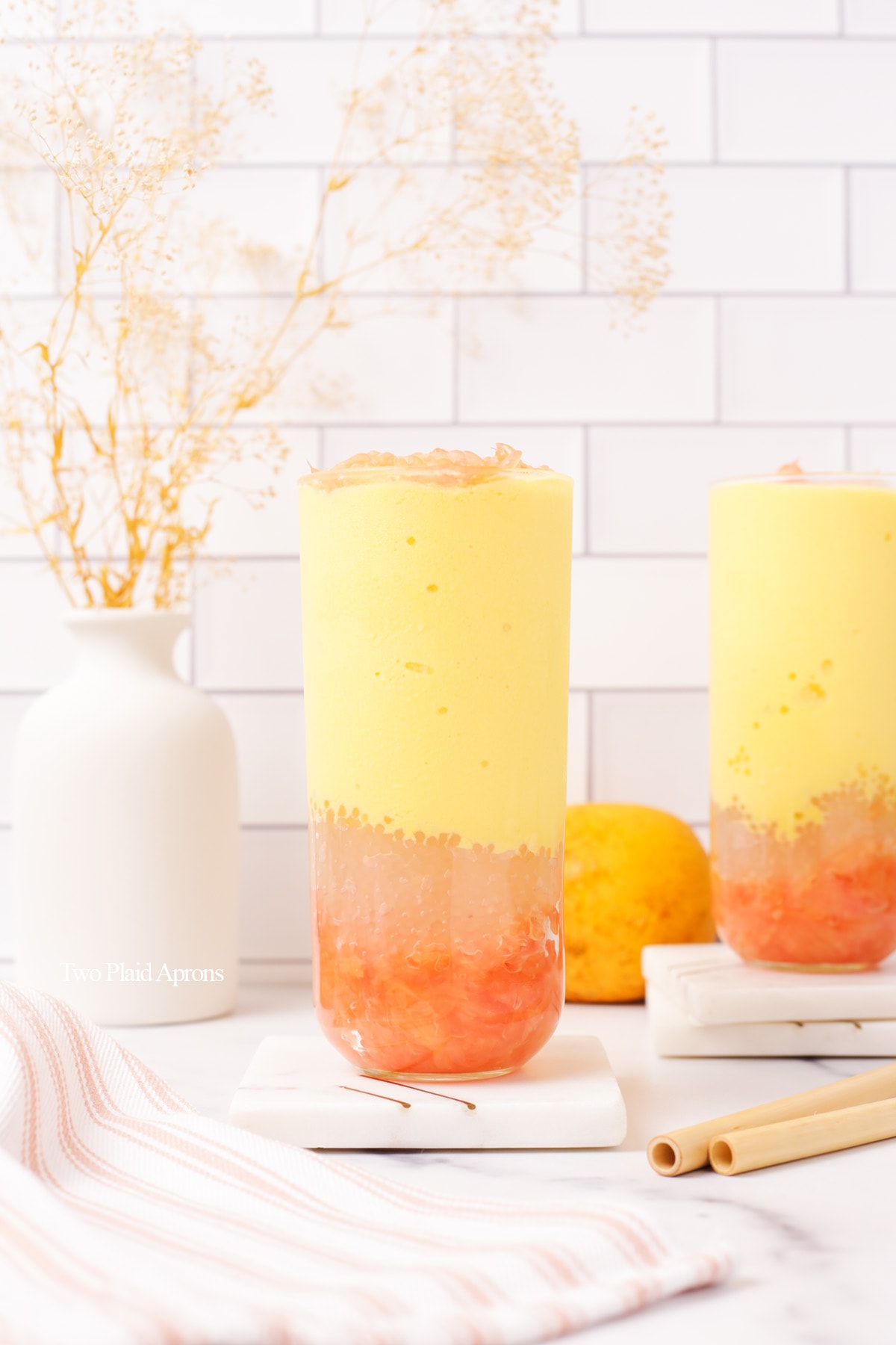 Mango pomelo sago layered in a cup.