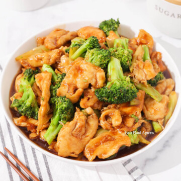 Chinese chicken and broccoli on a plate.