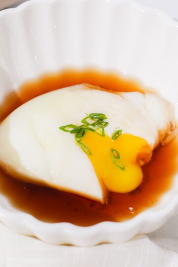 Egg yolk coming out of onsen tamago thumbnail.