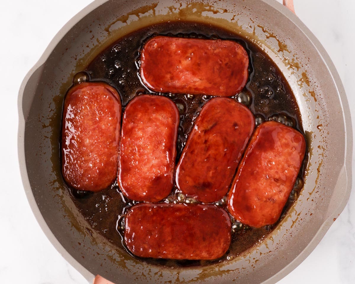 Soy glaze reduced in pan with spam.
