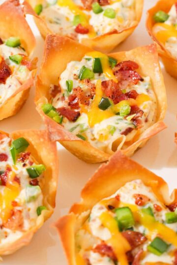 Close up of baked jalapeño popper wonton cups.