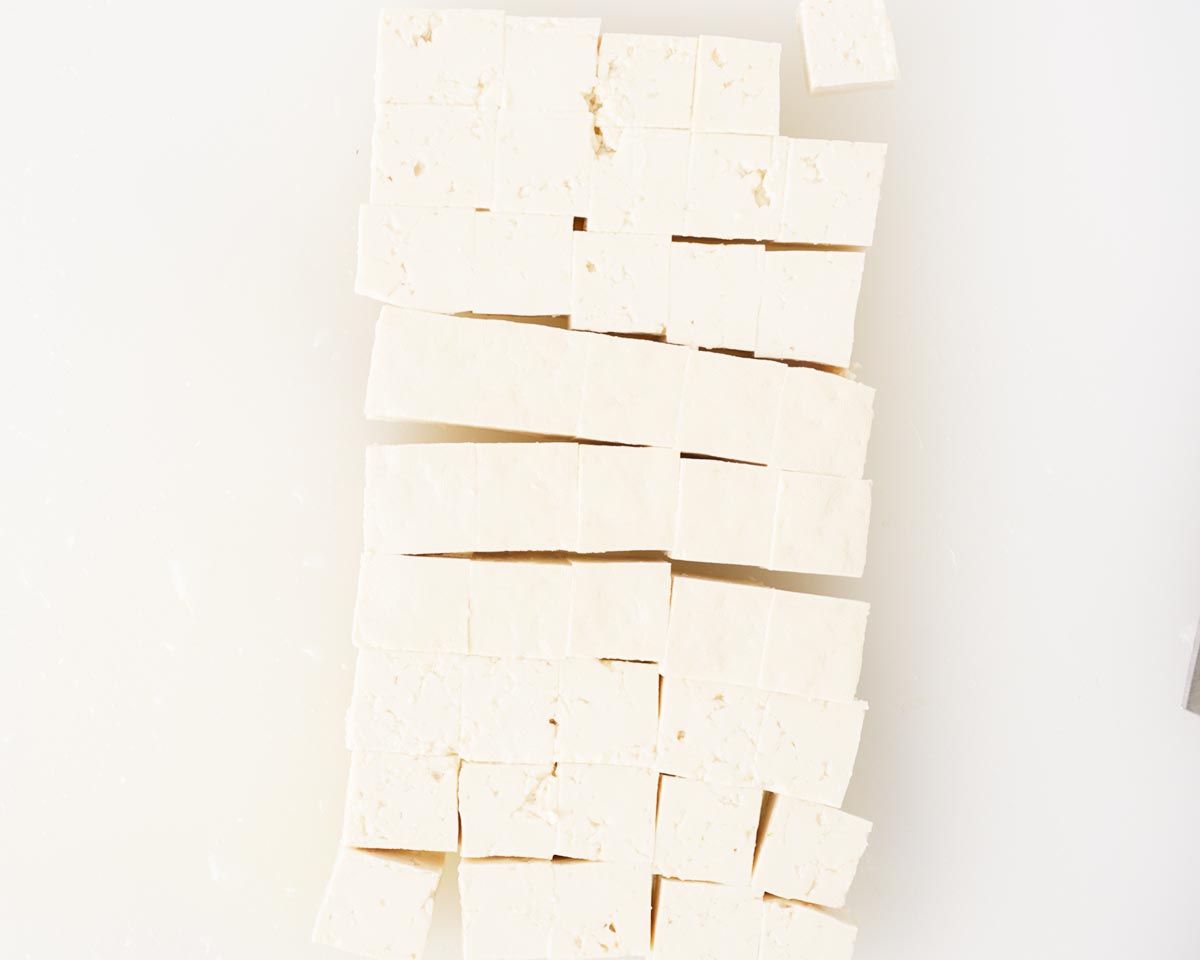 Tofu cut into small cubes.