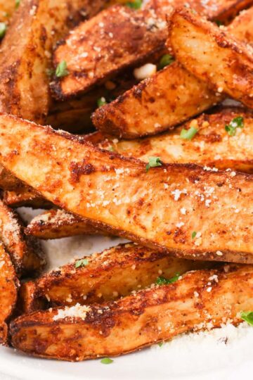 Close up air fryer potato wedge thumbnail.