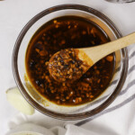 Garlic chili oil with spoon thumbnail.