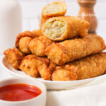 Side shot of Chinese egg rolls thumbnail.