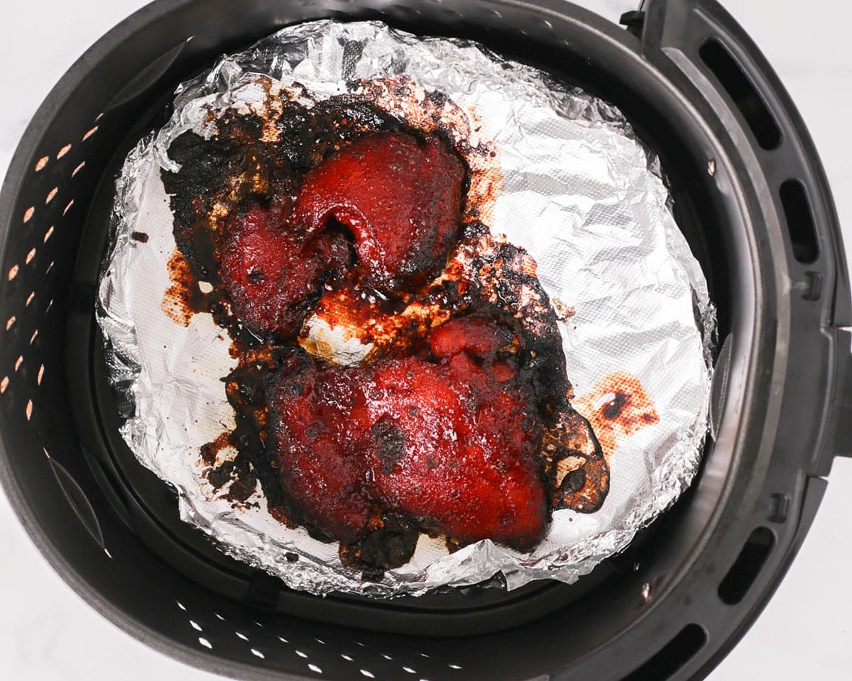 Char siu chicken cooked in air fryer basket.