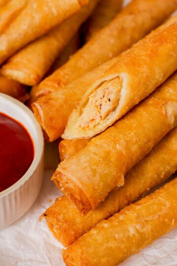 Close up of lumpia cut in half thumbnail shot.