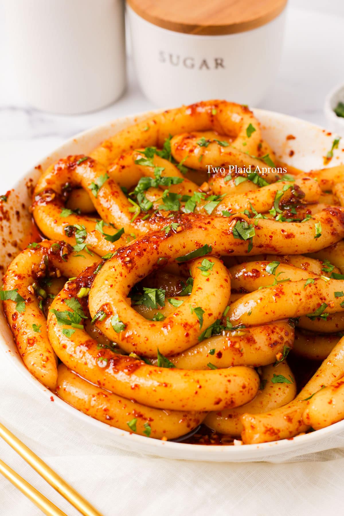 Close up of spicy potato noodles in a plate.