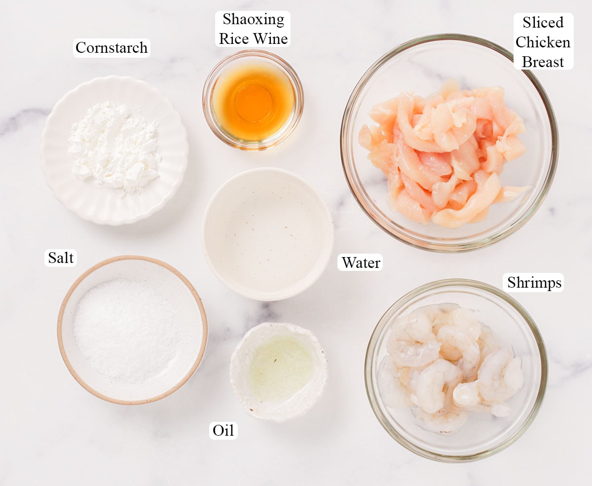 Ingredients for marinating sliced chicken and shrimps.