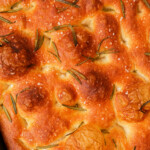 A close up of rosemary focaccia bread.