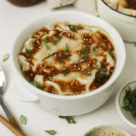 A ramekin of dumpling lasagna.