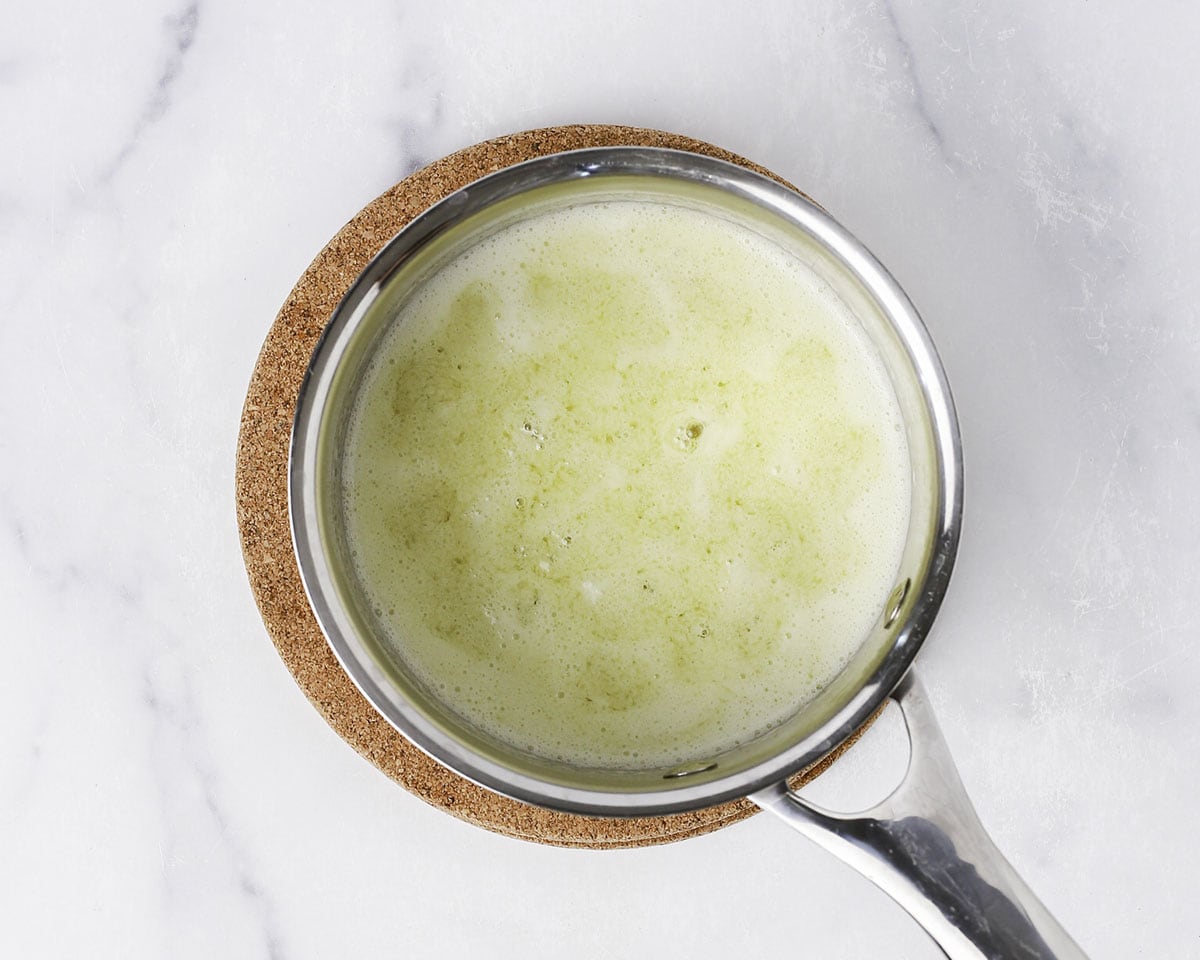 Butter melted in a saucepan.